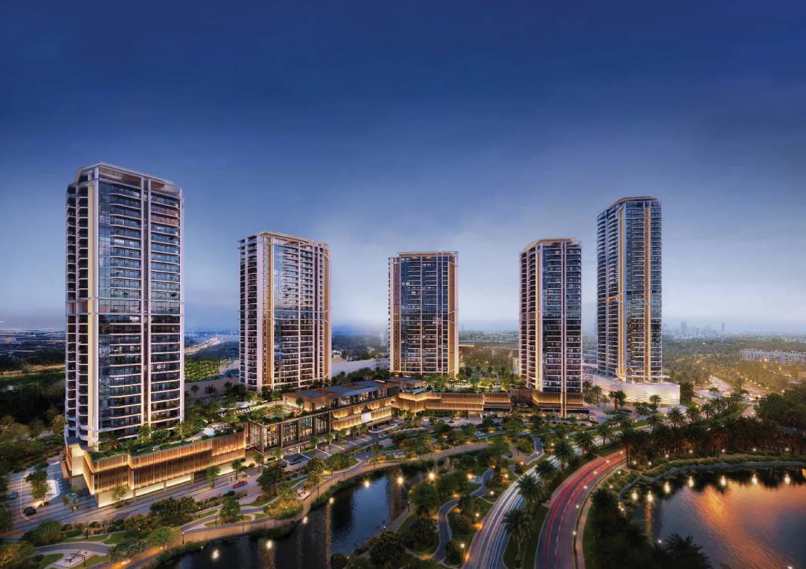 Altiera Views: a cluster of residential towers around landscaped grounds and water at dusk.